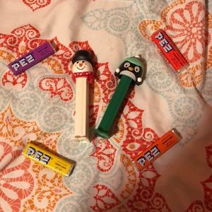 Snowman and penguin pez machines and 4 pez candys